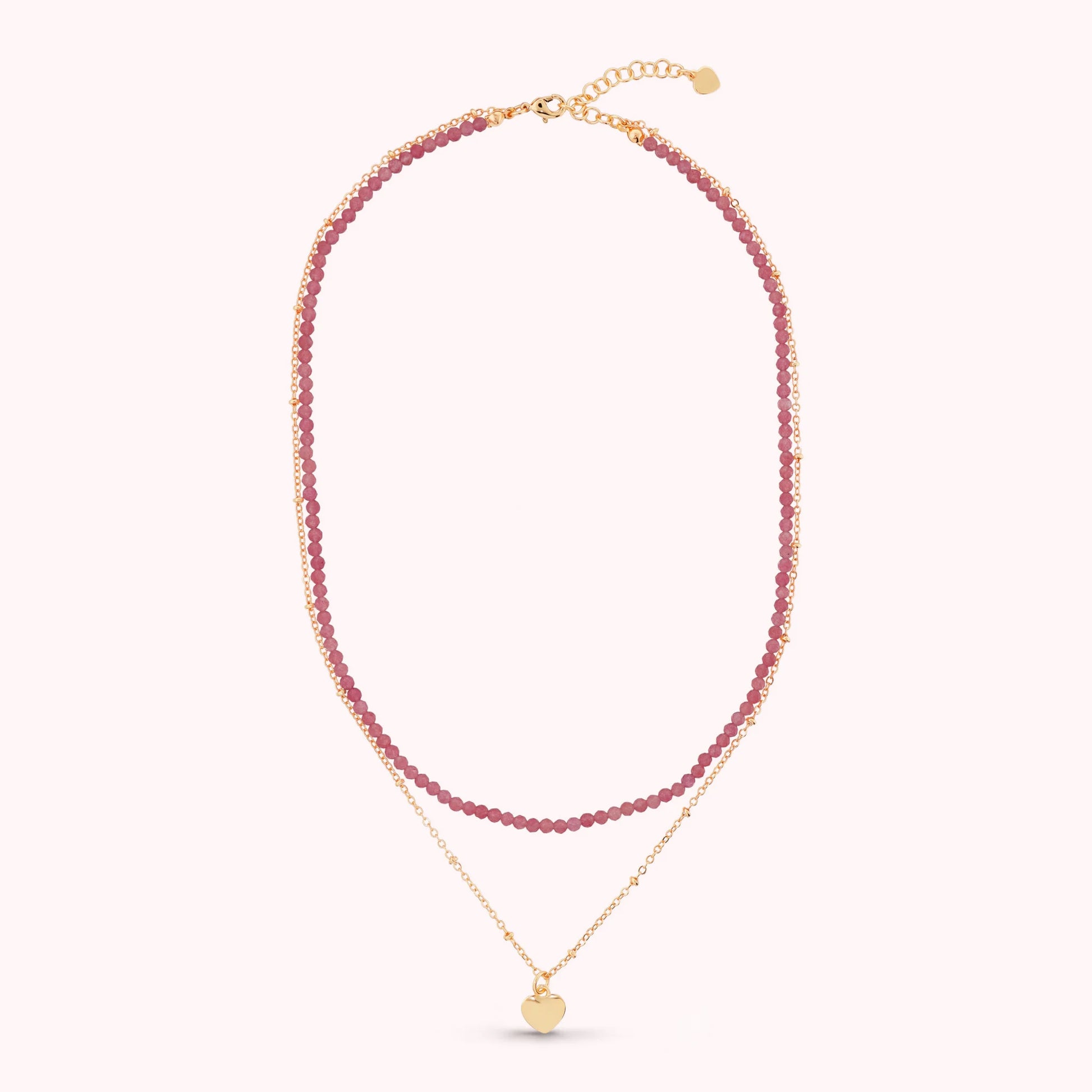 Mehrsträngige goldene Kette mit Herzanhänger und Natursteinen