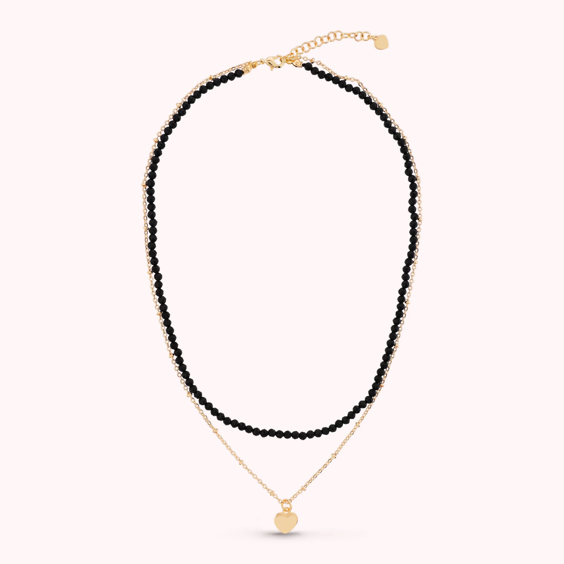 Mehrsträngige goldene Kette mit Herzanhänger und Natursteinen