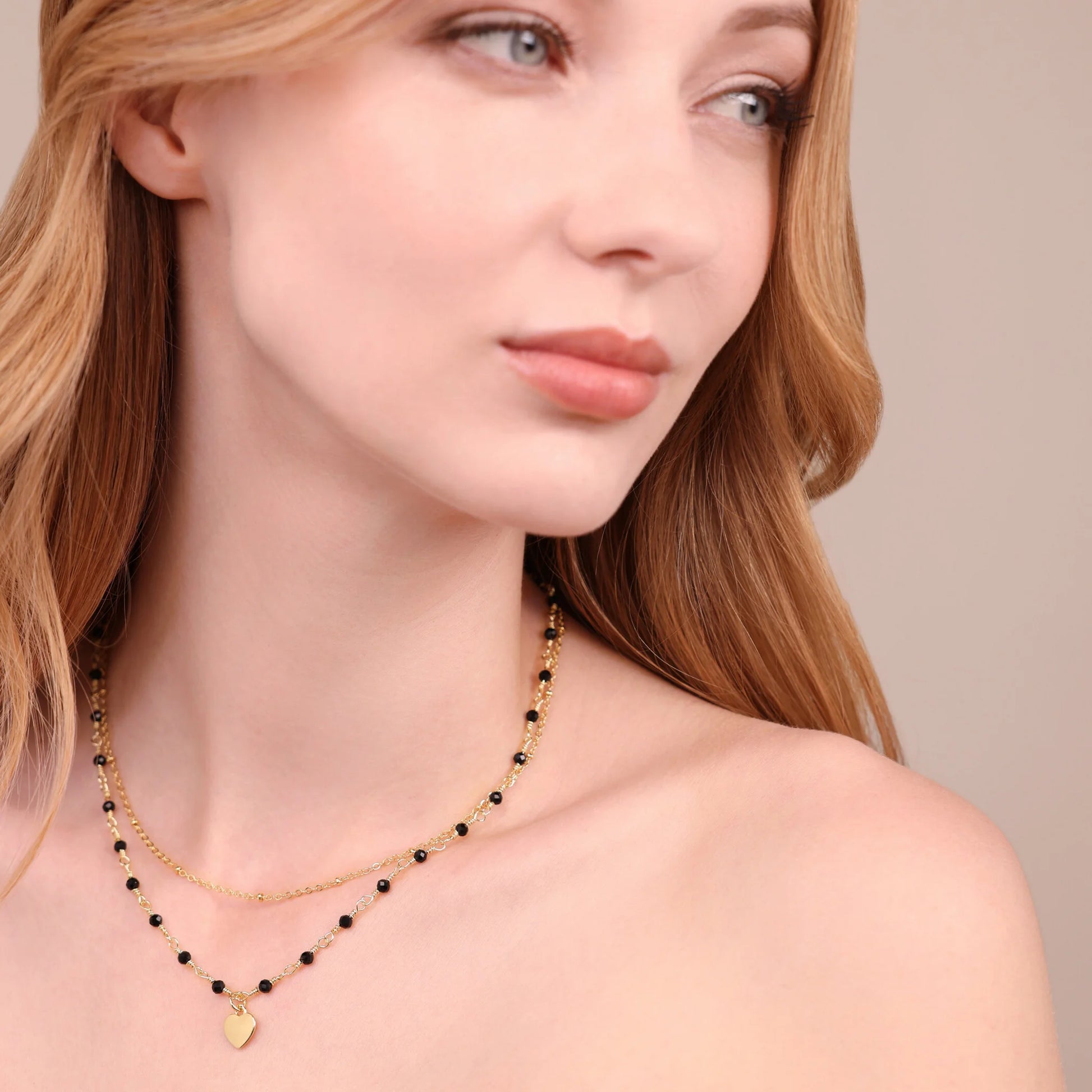 Golden Multistrand Rosary Necklace with Heart Pendant and Natural Quartzite Stones