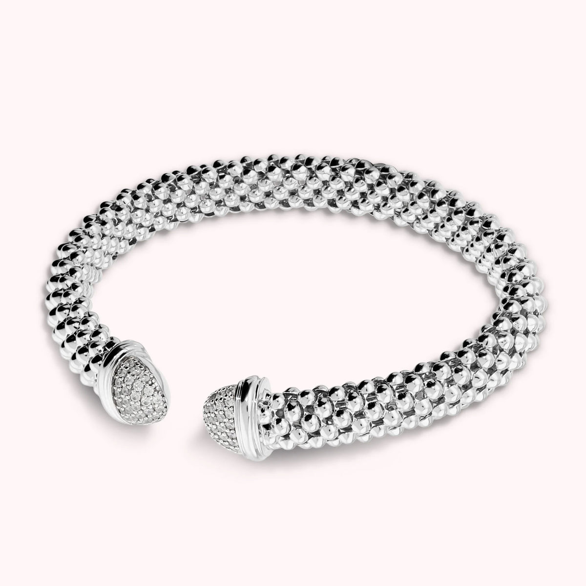 Open semi-rigid popcorn mesh bracelet with cubic zirconia pavé ends
