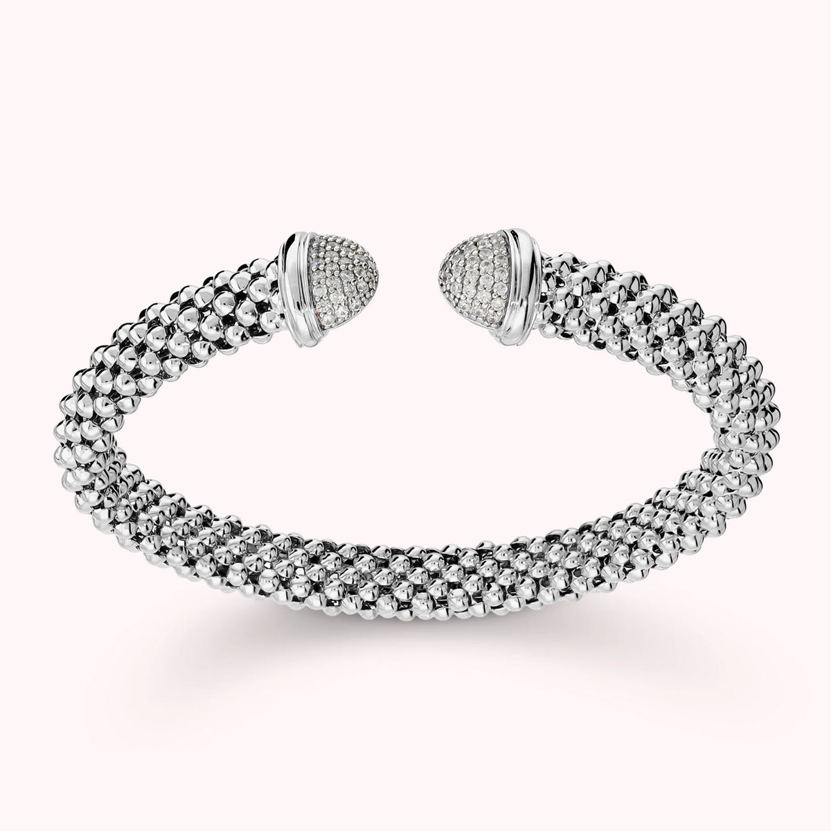 Open semi-rigid popcorn mesh bracelet with cubic zirconia pavé ends