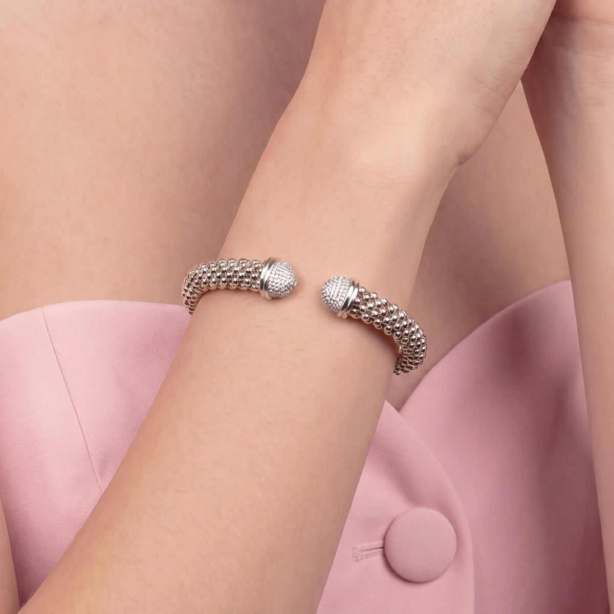 Open semi-rigid popcorn mesh bracelet with cubic zirconia pavé ends