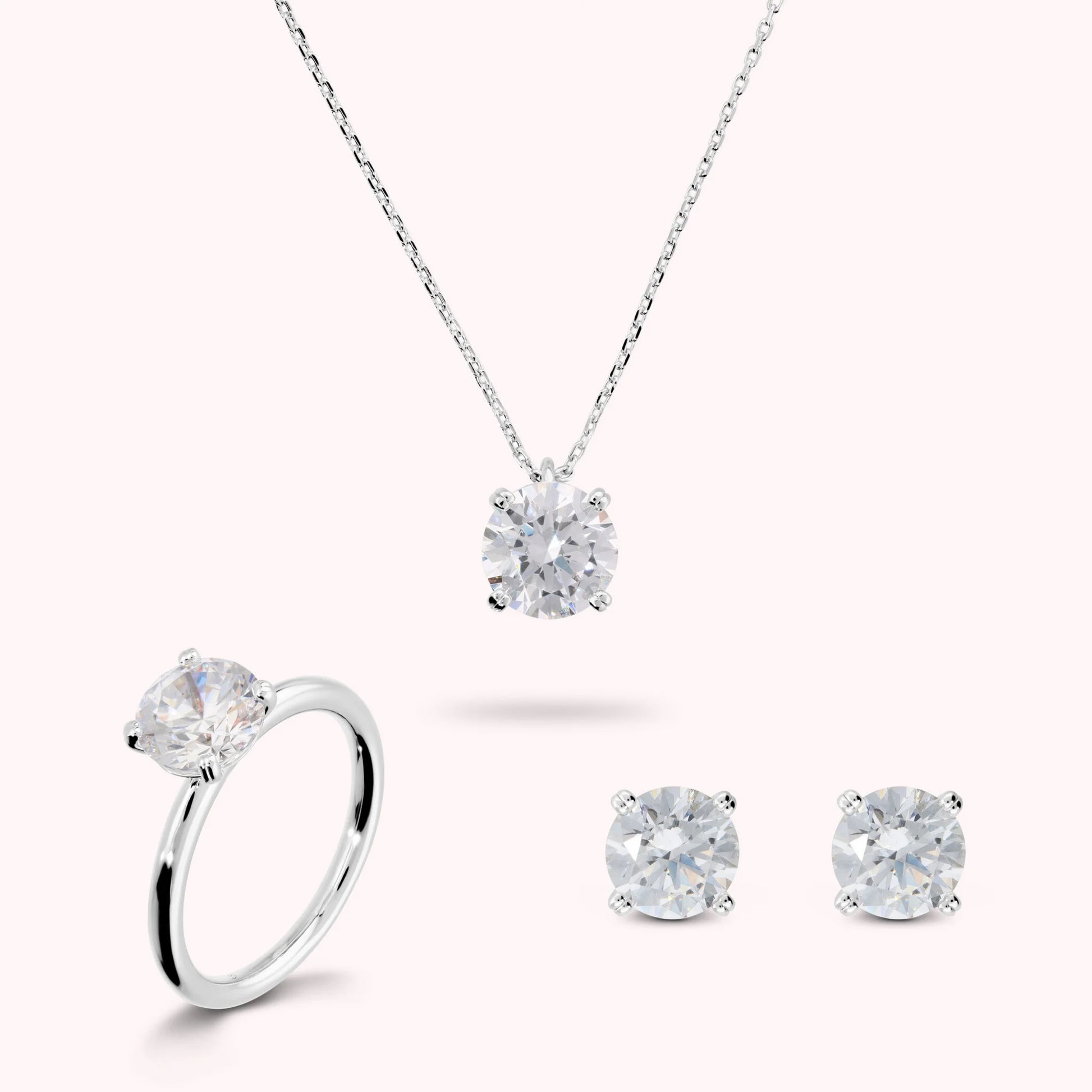 Set Glow Collana + Orecchini + Anello Solitario con Punto Luce in Cubic Zirconia Bianca