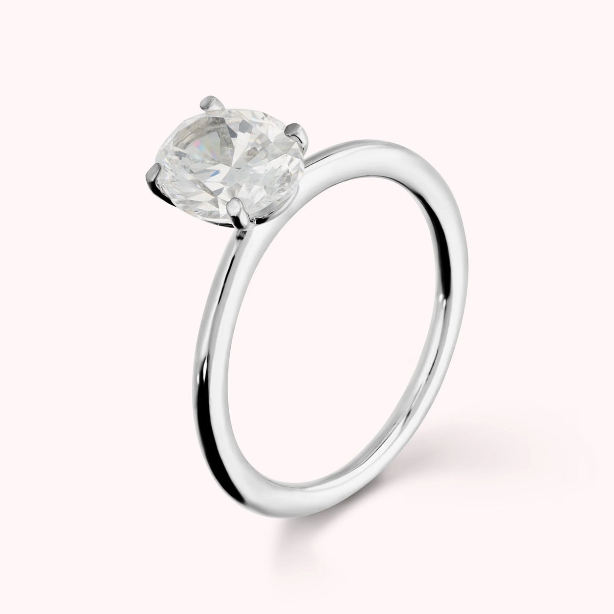 Solitaire Ring Moments of Light with White Cubic Zirconia Oval