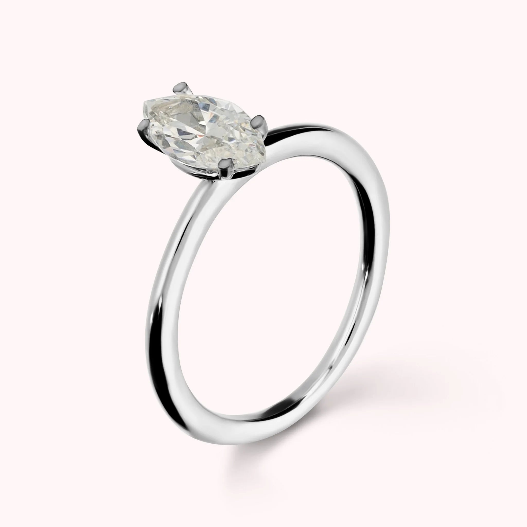 Solitaire Ring Moments of Light with White Cubic Zirconia Marquise