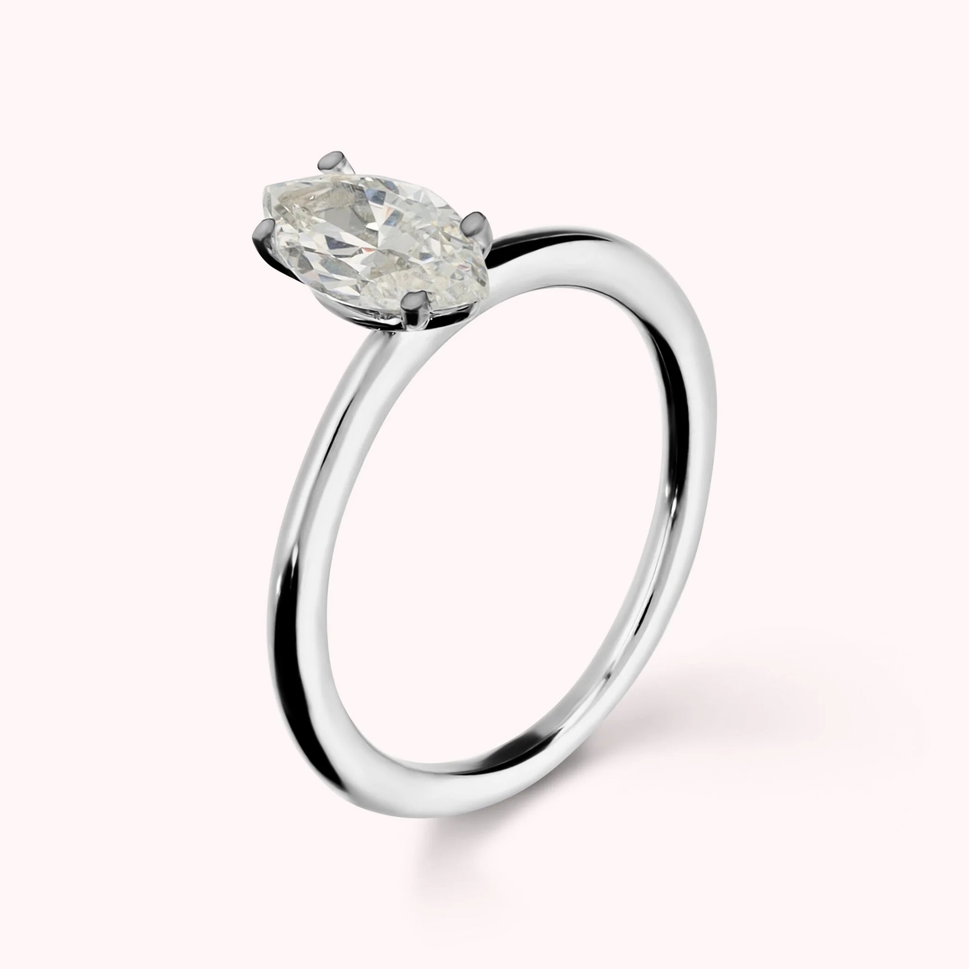 Solitaire Ring Moments of Light with White Cubic Zirconia Marquise