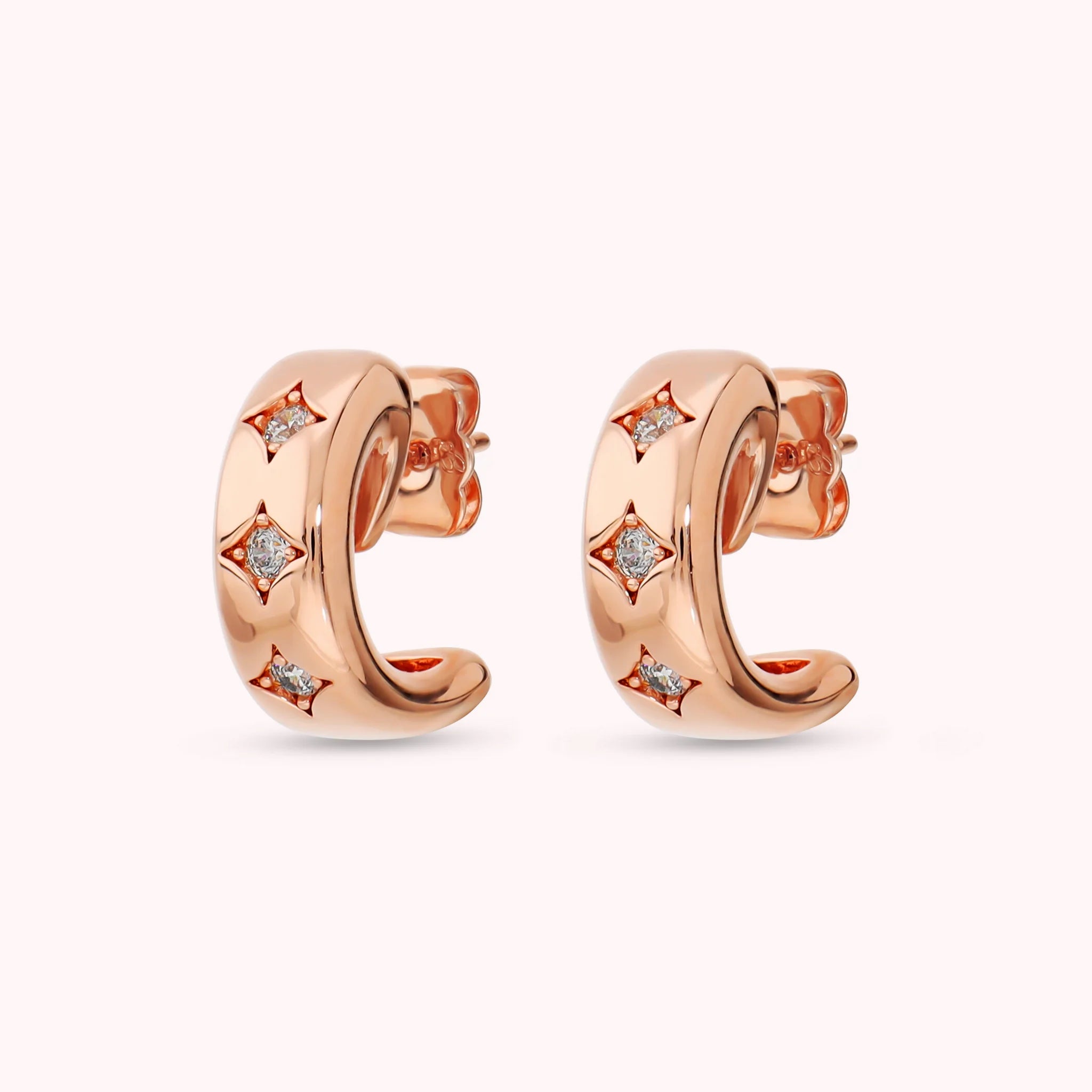 Étoile earrings with cubic zirconia points of light, plated with 18Kt gold