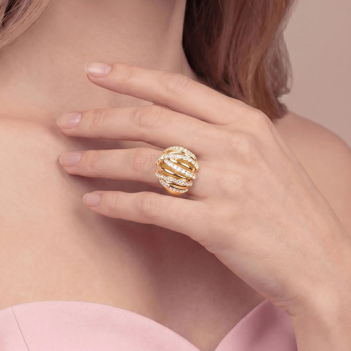 Braided multi-strand band ring with cubic zirconia, plated with 18Kt gold