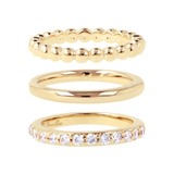Ensemble de trois anneaux dorés avec zircon cubique