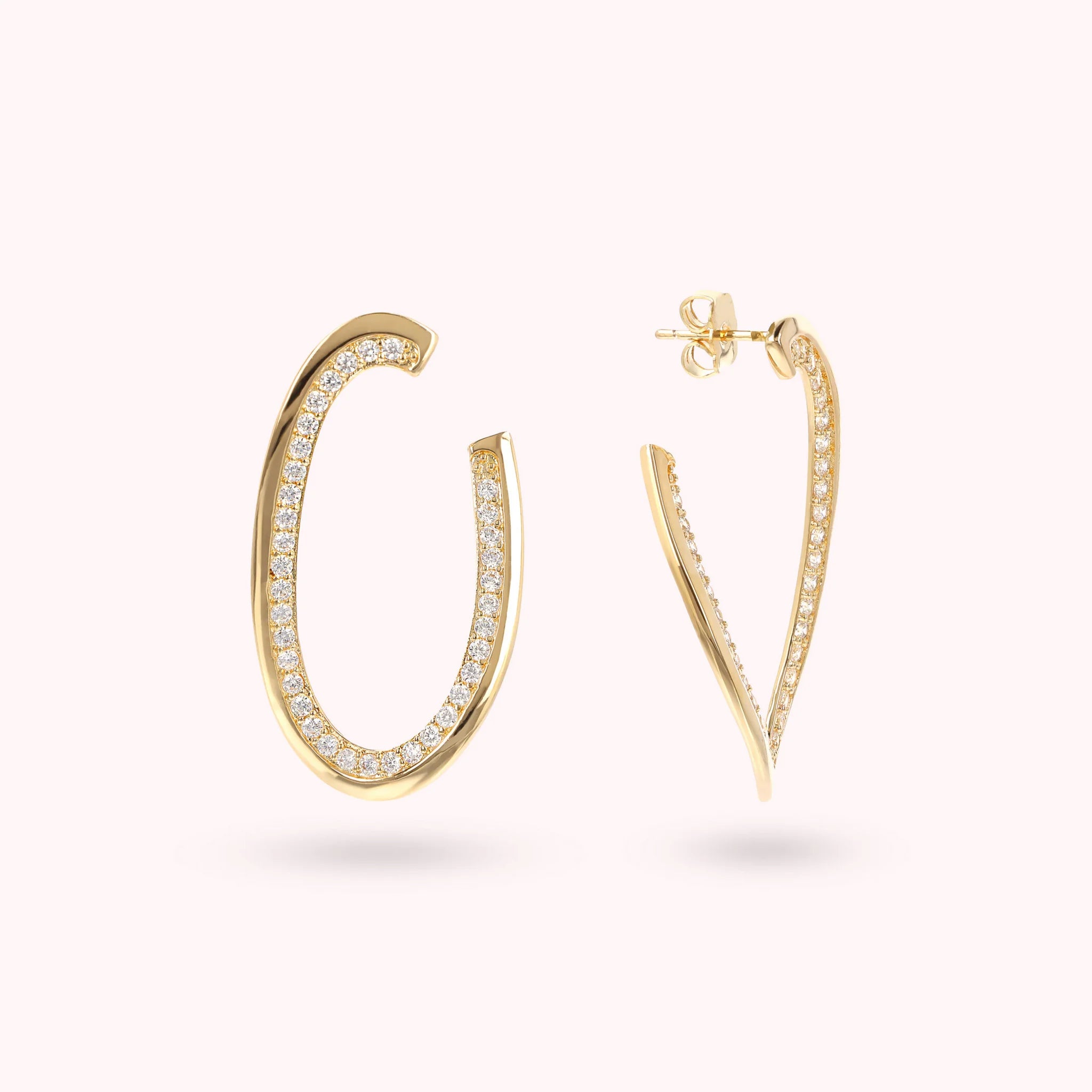 Golden Oval Dangle Earrings with Cubic Zirconia