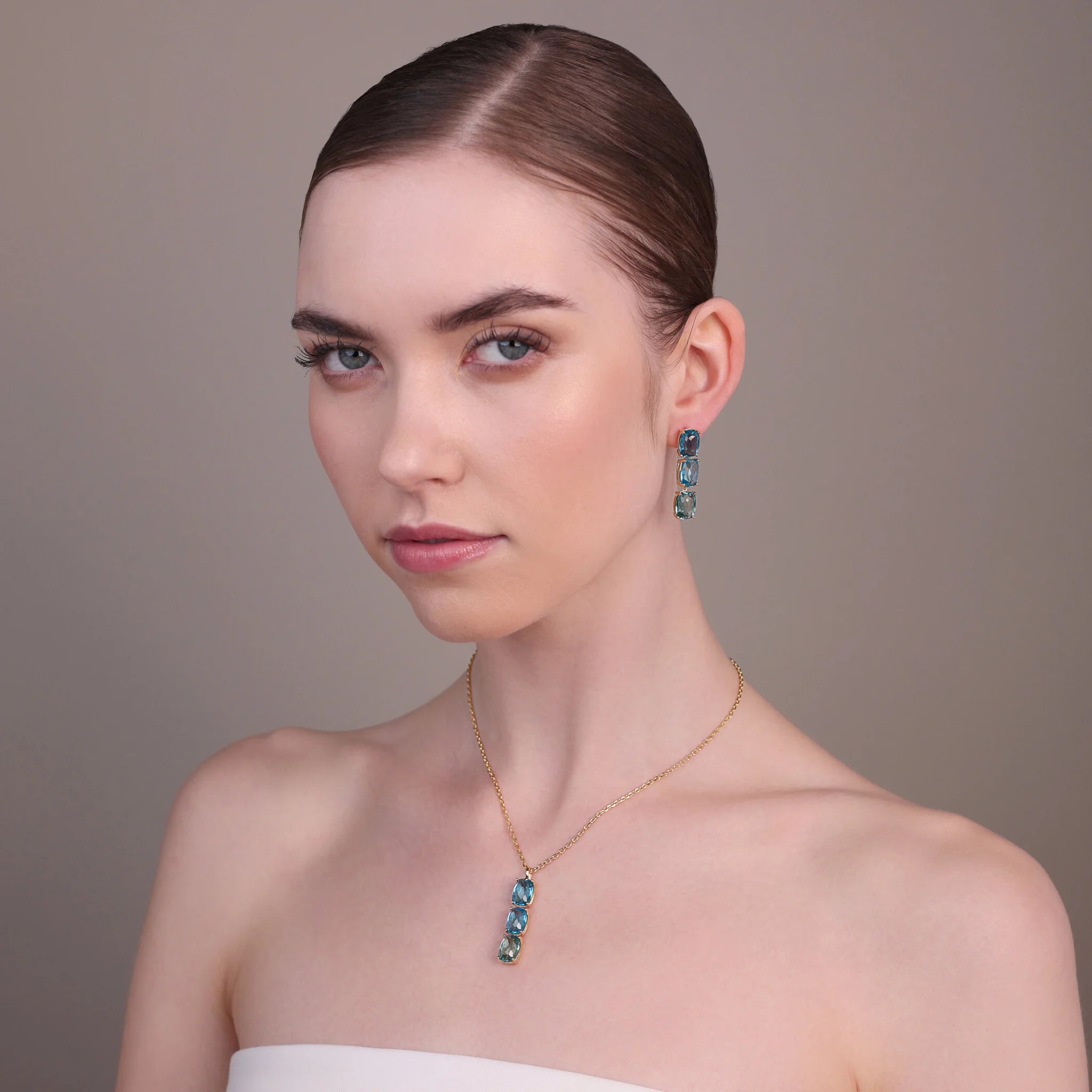 Golden Dangle Earrings with Green and Blue Mosaic Cut Prisma Gems  