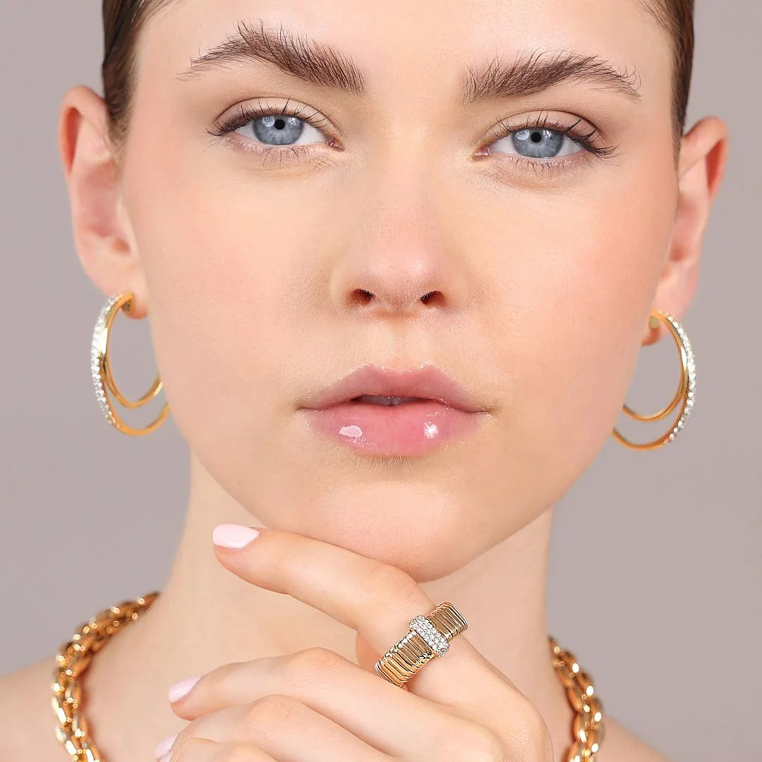 Goldener Tubogas-Ring mit Cubic-Zirkonia-Pavé
