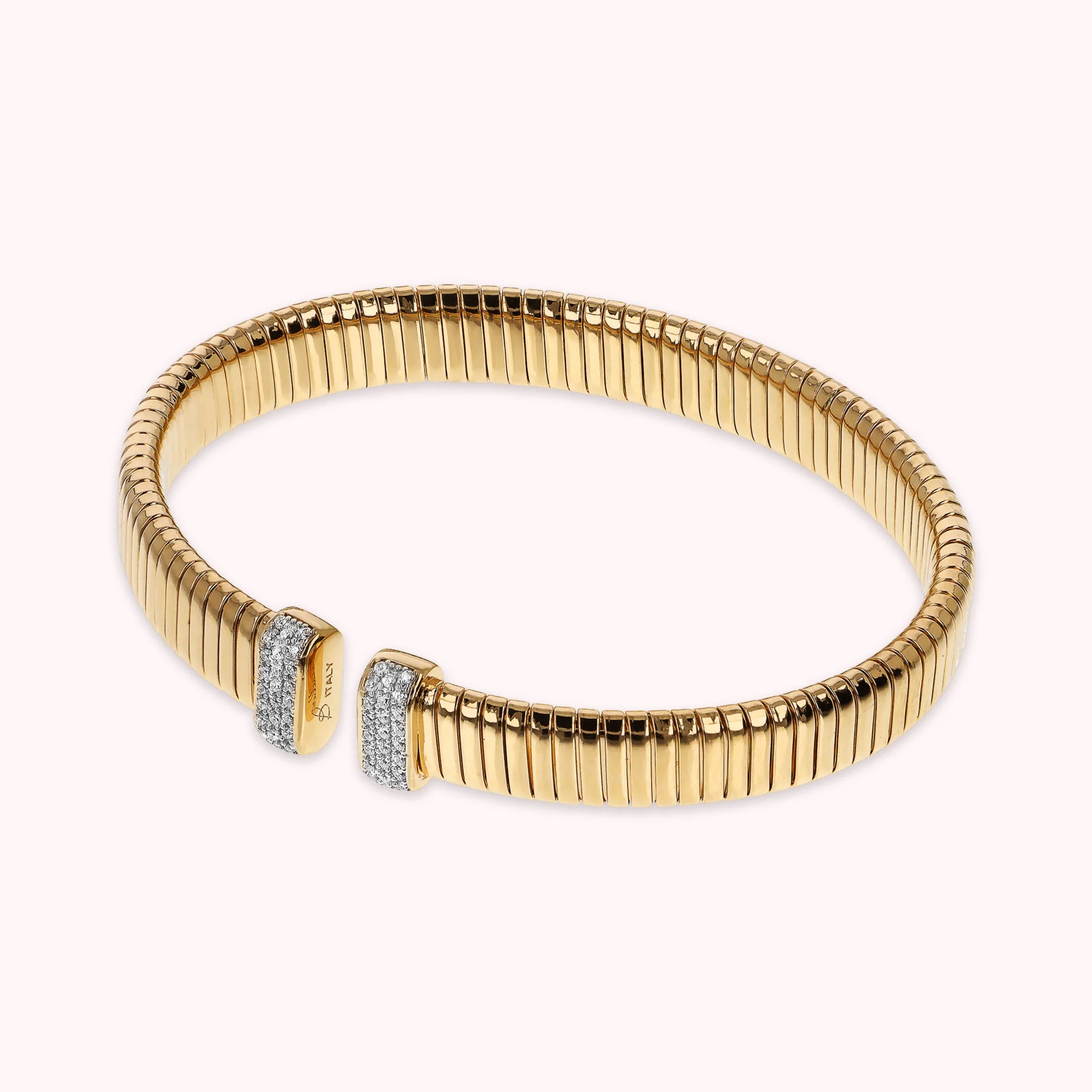 Goldenes Armband aus starrem Tubogas mit Cubic Zirkonia-Pavé