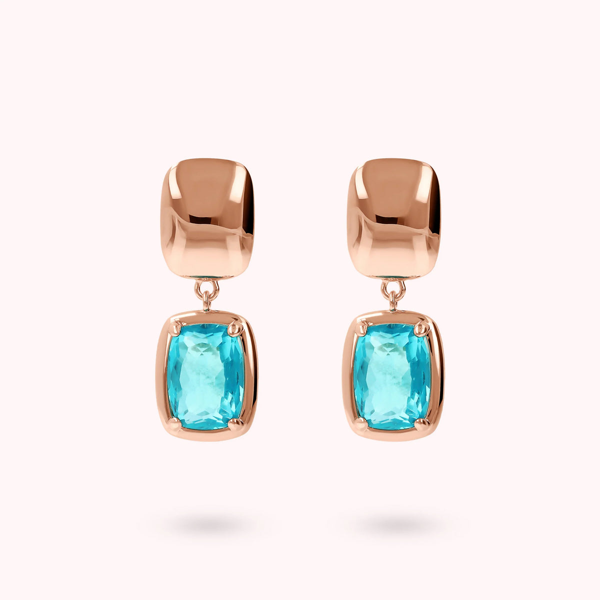 Boucles d'oreilles pendantes avec des pépites brillantes et un prisme de pierre baguette